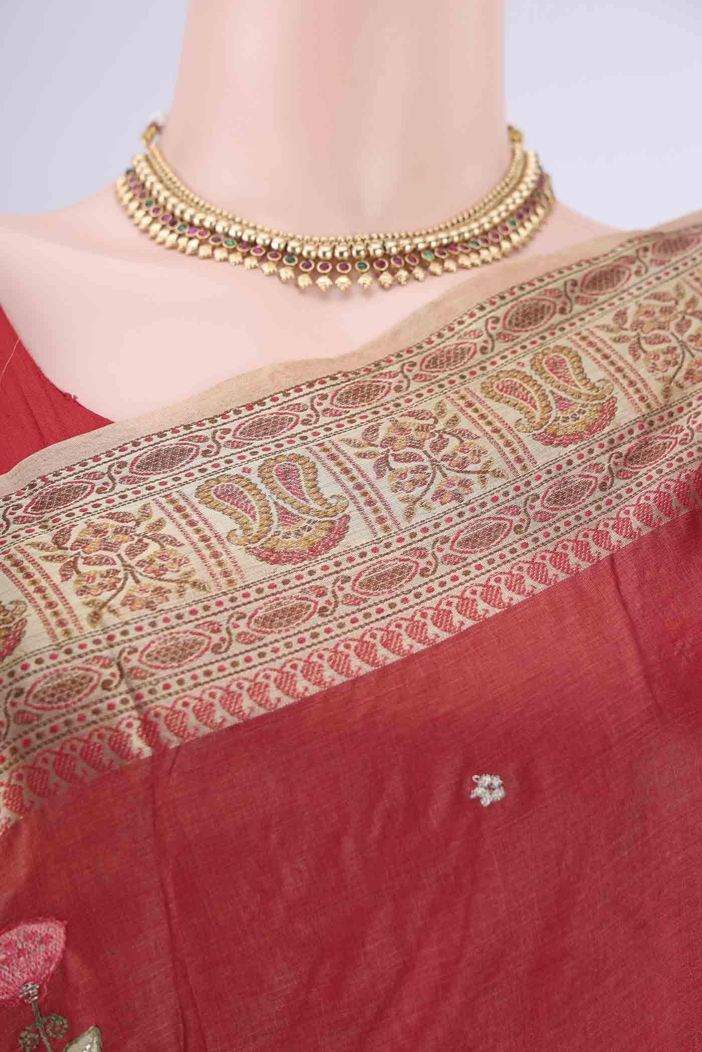 Border image of Red Banarasi Tussar Silk Saree with Embroidery on the body and Zari Border. 