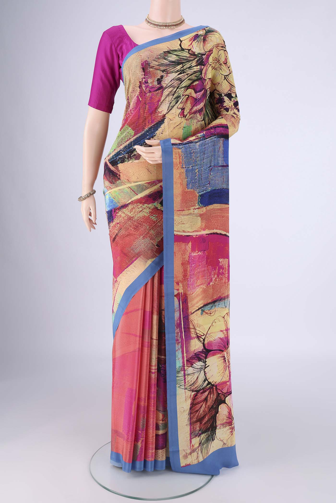 Multi Color Mysore Crepe Saree with Printed design on the body and Printed Border.  displayed on a mannequin