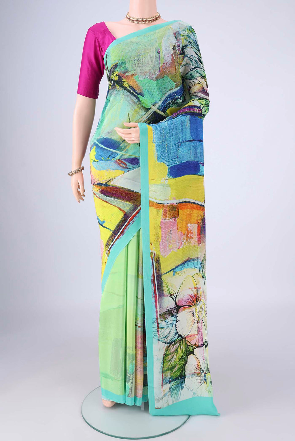 Multi Color Mysore Crepe Saree with Printed design on the body and Printed Border.  displayed on a mannequin