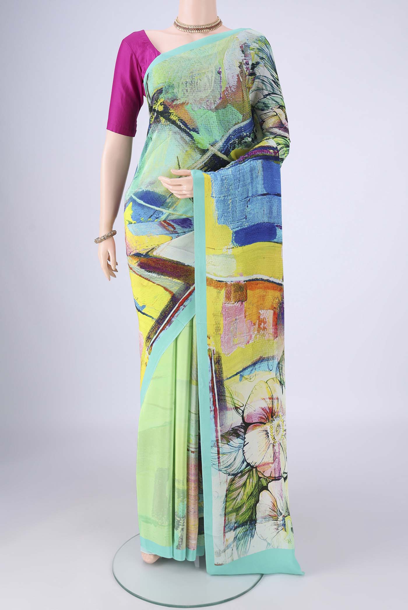 Multi Color Mysore Crepe Saree with Printed design on the body and Printed Border.  displayed on a mannequin