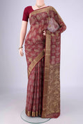 Maroon Mysore Crepe Saree with Printed design on the body and Zari Border.  displayed on a mannequin