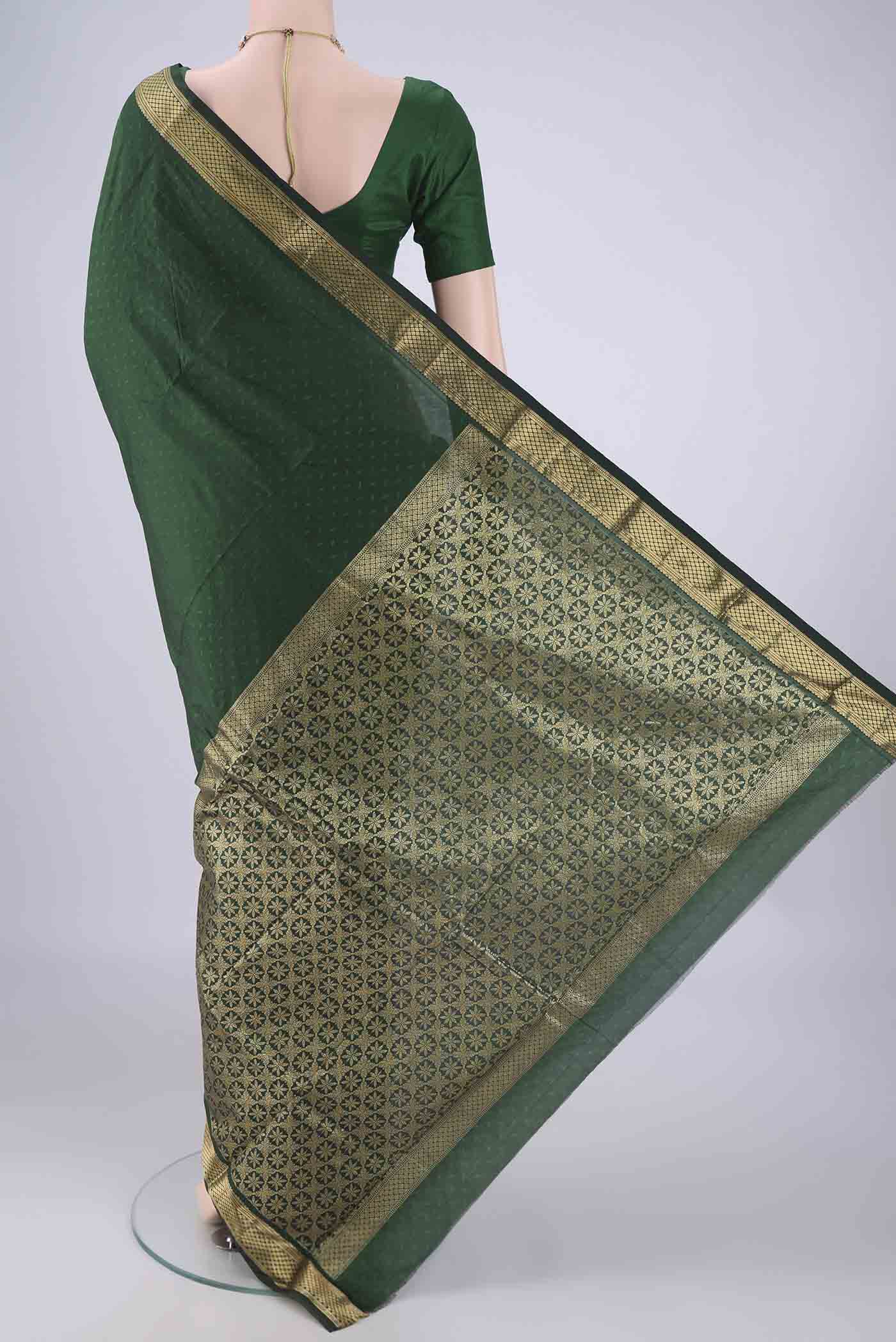 Flat view of Bottle Green Blended Bangalore Silk Saree with Jacquard design on the body and Zari Border. 