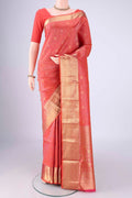 Brick Orange Soft Silk Saree with Zari Brocade on the body and Zari Border.  displayed on a mannequin