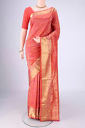 Coral Soft Silk Saree with Zari Brocade on the body and Zari Border.  displayed on a mannequin
