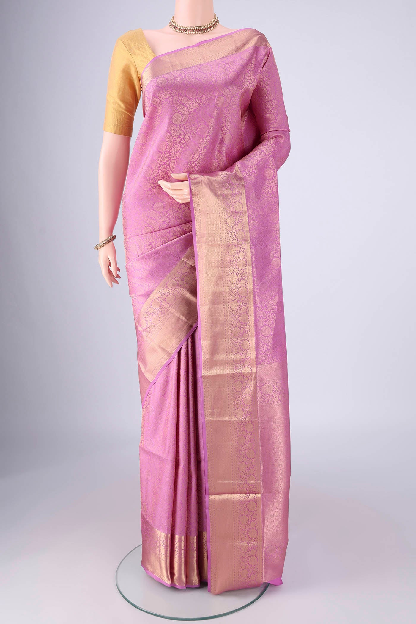 Lavender Dual Tone Soft Silk Saree with Zari Brocade on the body and Zari Border.  displayed on a mannequin