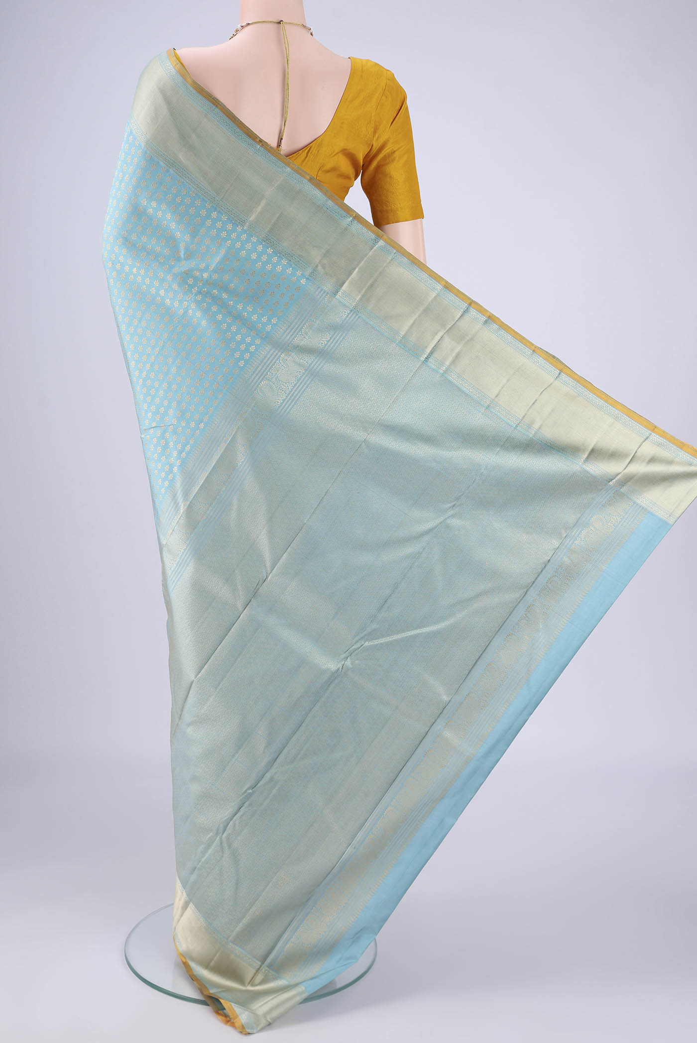 Flat view of Sky Blue Kanchipuram Silk Saree with Thread Brocade on the body and Thread Border. 