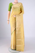 Lemon Yellow Kanchipuram Silk Saree with Jacquard design on the body and Zari Border.  displayed on a mannequin