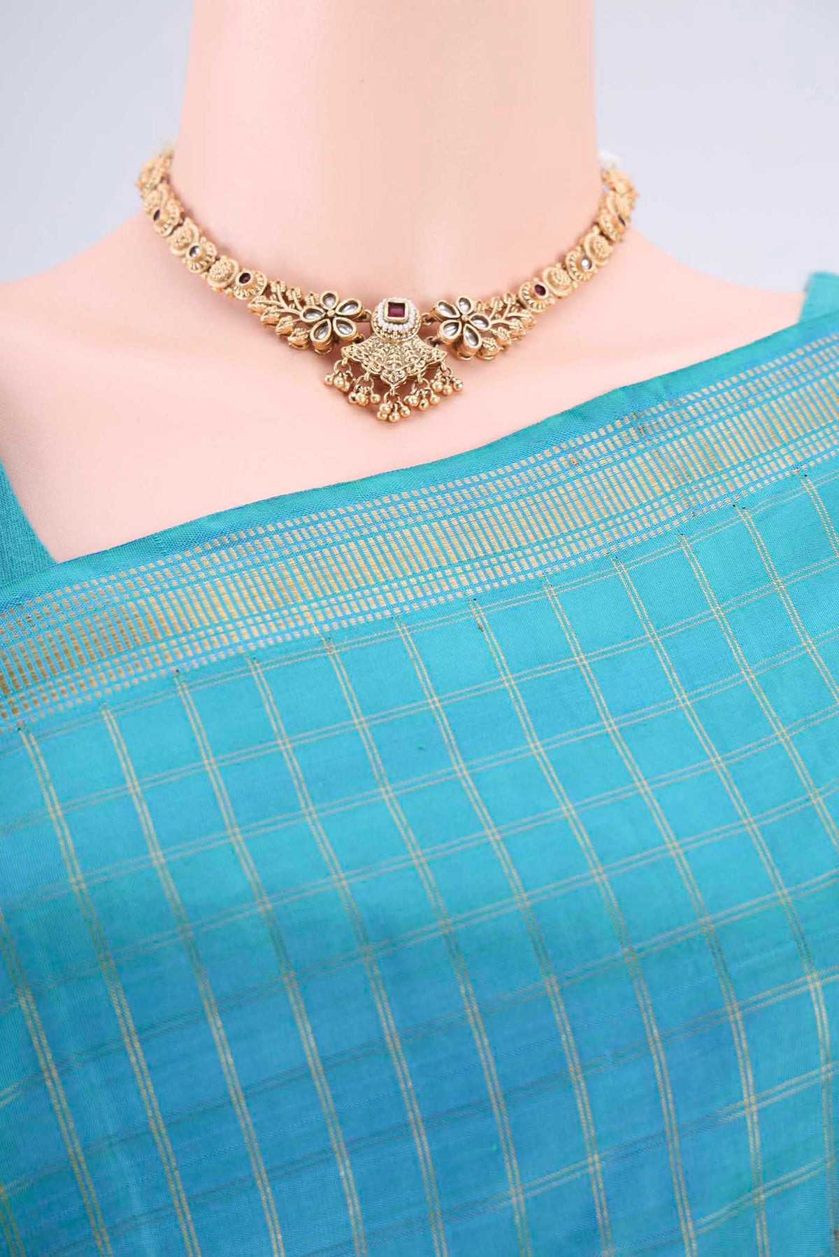 Border image of Pure Silk Pure Zari Light Blue Kanchipuram Saree with Checked design on the body and Zari Border. 