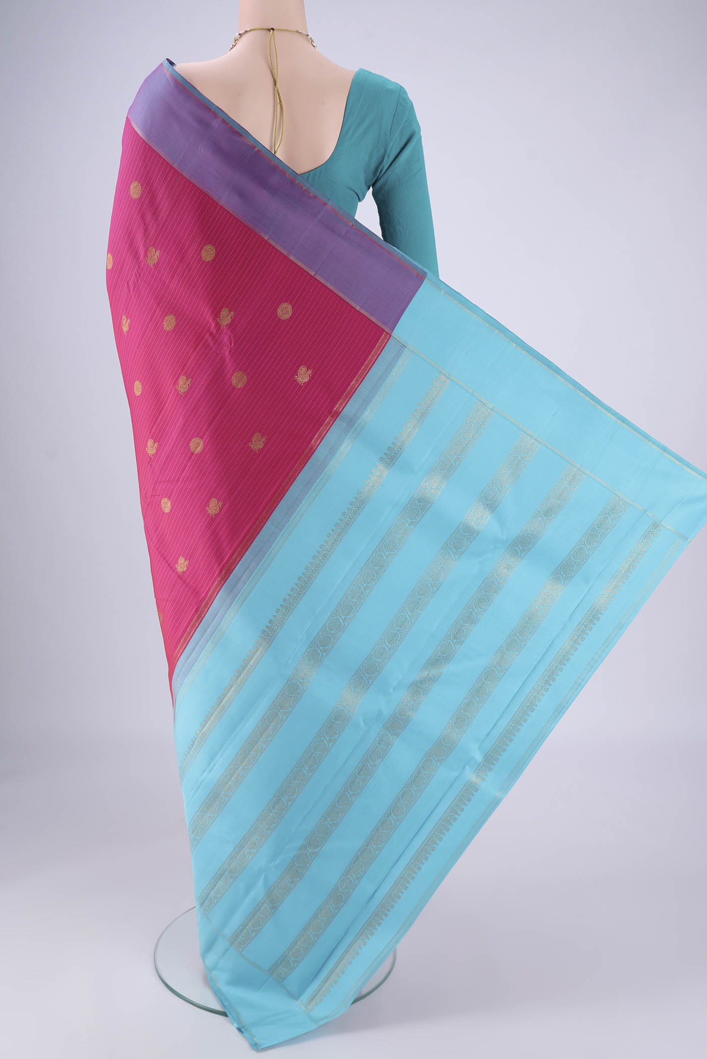 Flat view of Dark Pink Kanjivaram Silk Saree with Zari Butta on the body and Zari Border. 
