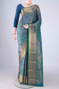 Peacock Blue Dual Tone Kanchipuram Silk Saree with Zari Brocade on the body and Zari Border.  displayed on a mannequin