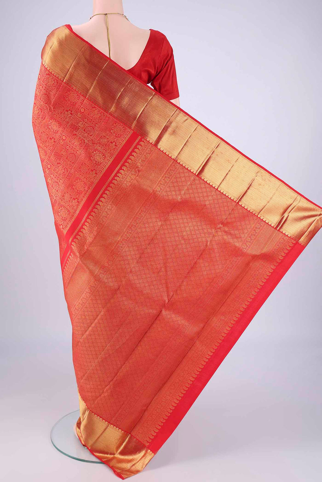 Flat view of Pure Silk Pure Zari Red Kanjivaram Saree with Zari Brocade on the body and Zari Border. 
