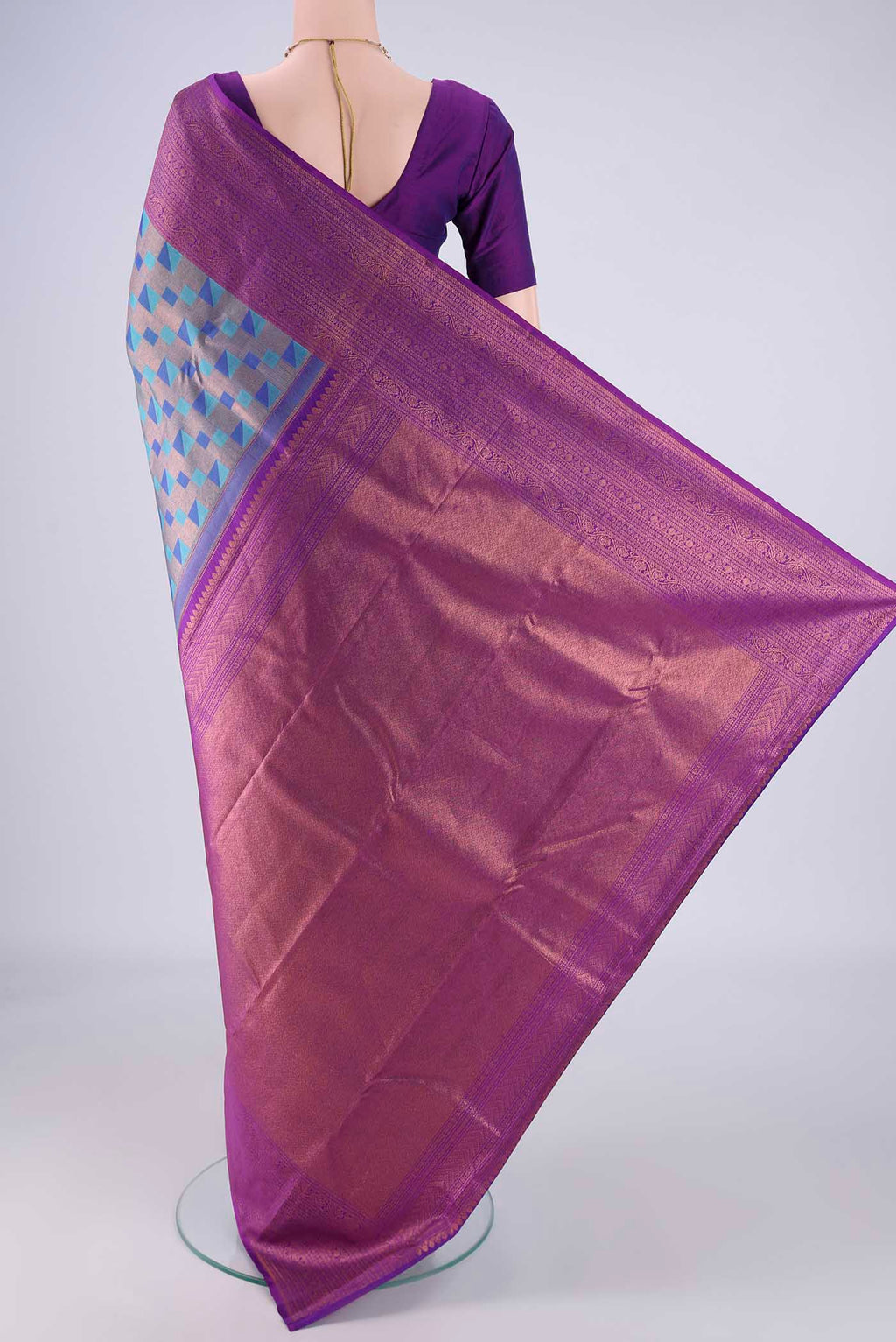 Flat view of Turquoise Kanchipuram Silk Saree with Zari Brocade on the body and Zari Border. 