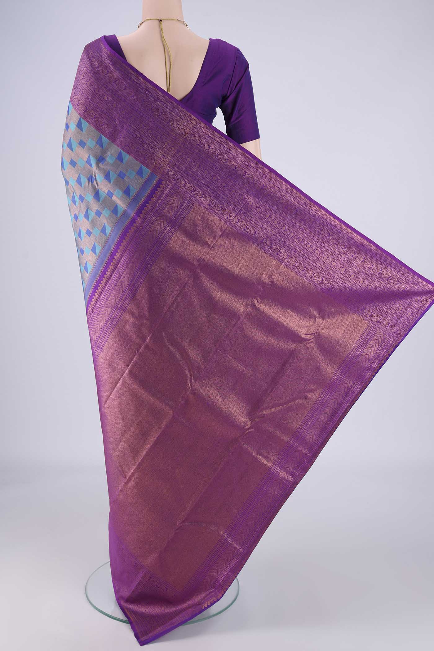 Flat view of Turquoise Kanchipuram Silk Saree with Zari Brocade on the body and Zari Border. 