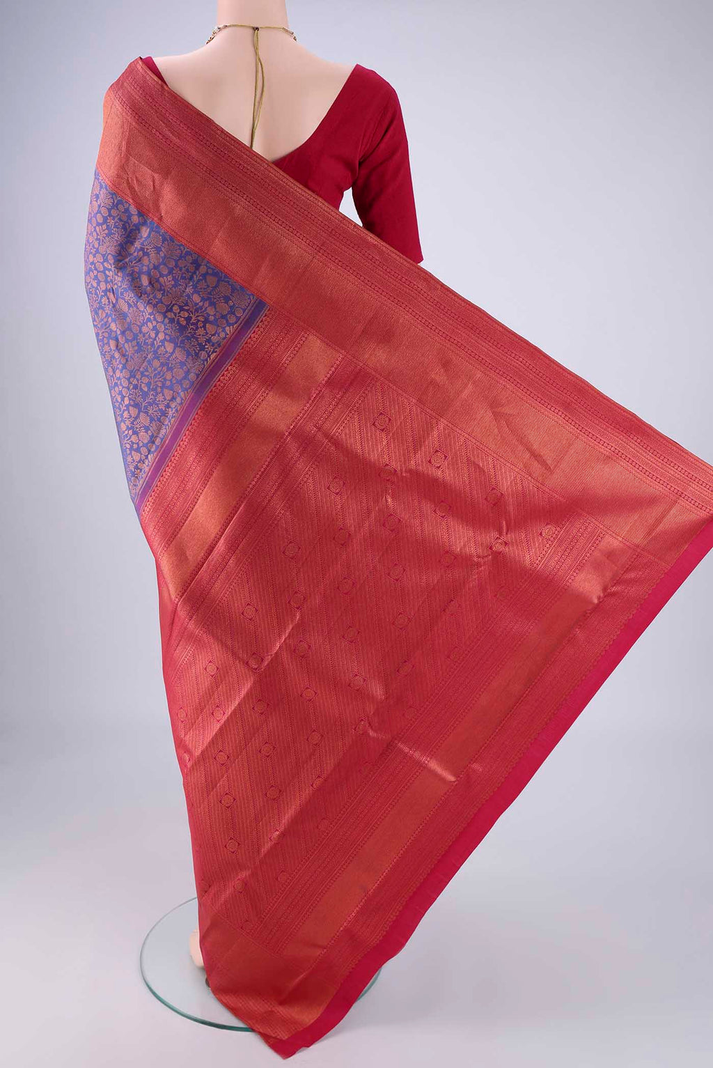 Flat view of Purple Kanchipuram Silk Saree with Zari Brocade on the body and Zari Border. 