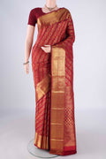 Maroon Kanjivaram Silk Saree with Zari Brocade on the body and Zari Border.  displayed on a mannequin
