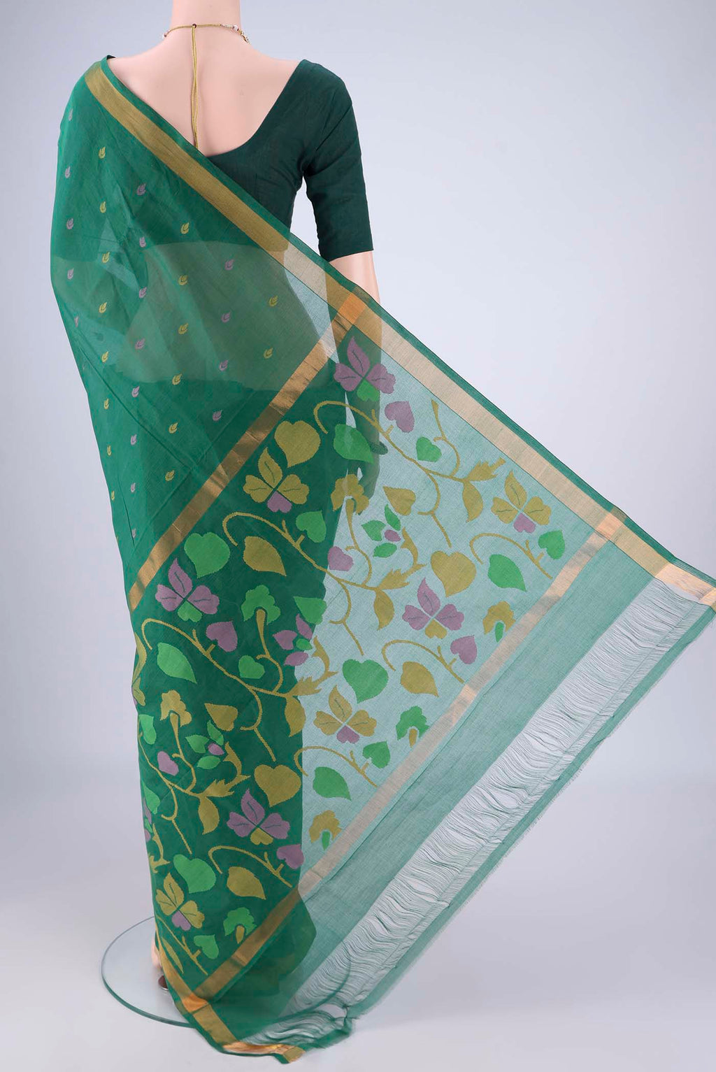 Flat view of Bottle Green Uppada Cotton Saree with Thread Butta on the body and Zari Border. 