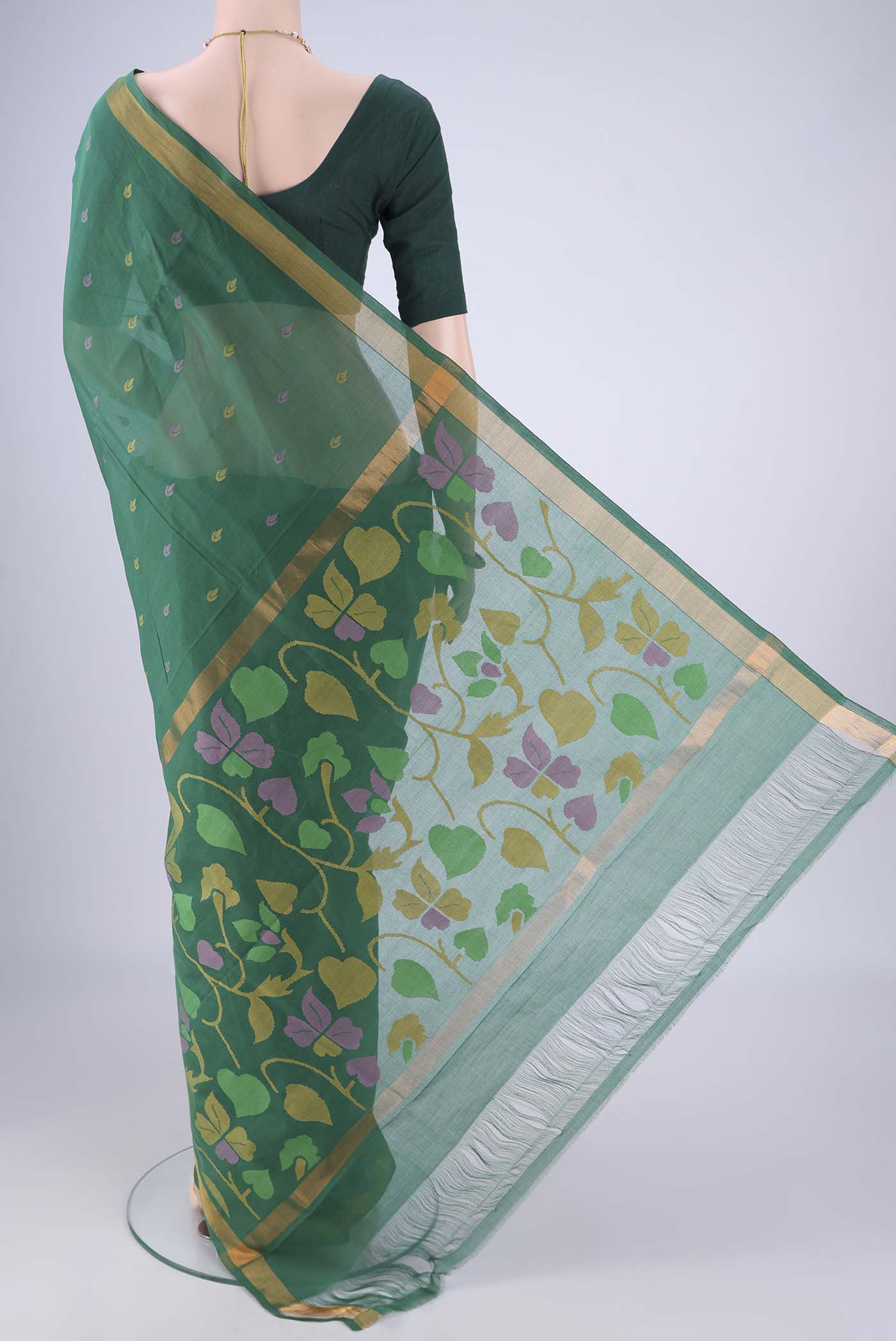 Flat view of Bottle Green Uppada Cotton Saree with Thread Butta on the body and Zari Border. 