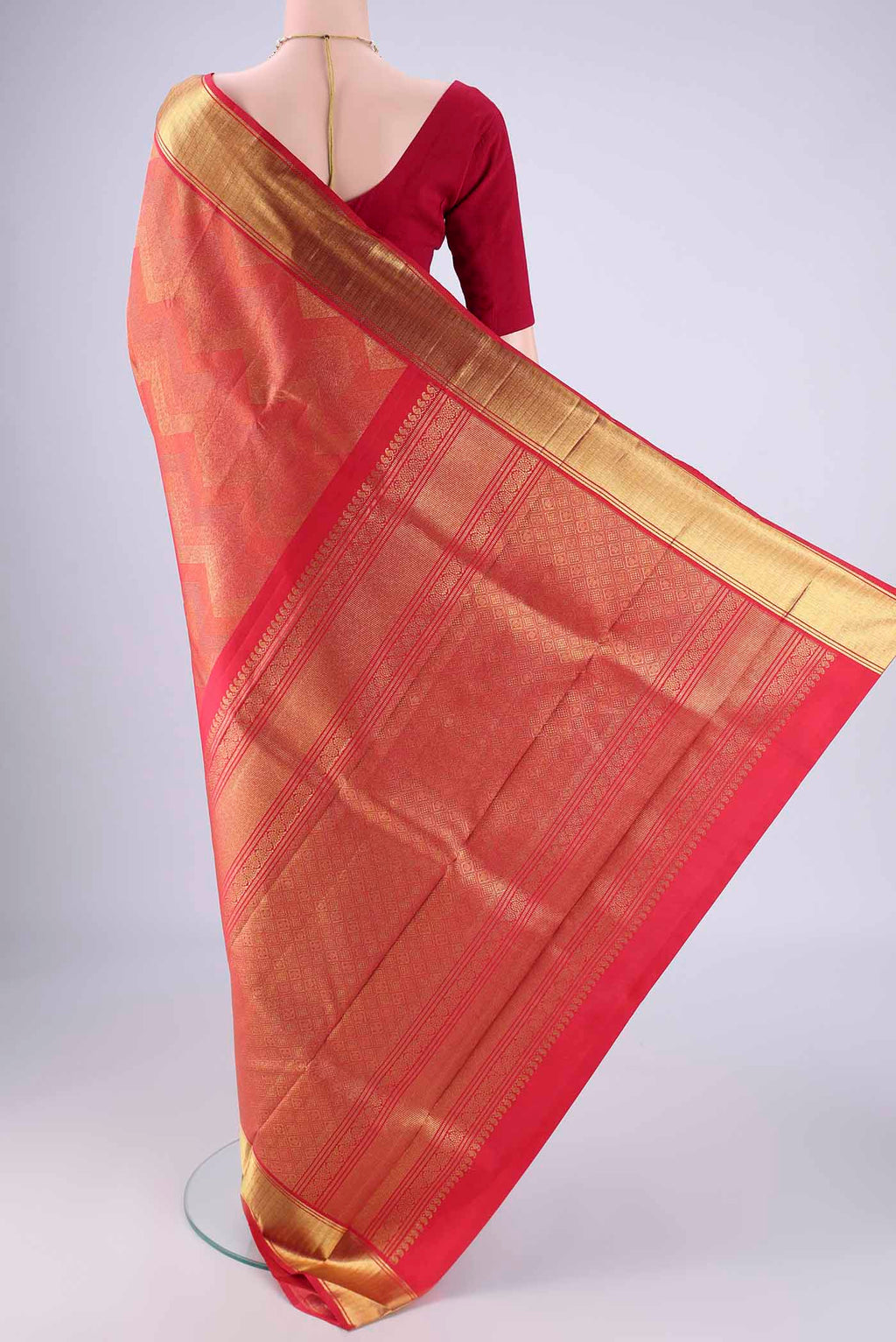 Flat view of Pure Silk Pure Zari Red Kanjivaram Saree with Zari Brocade on the body and Zari Border. 
