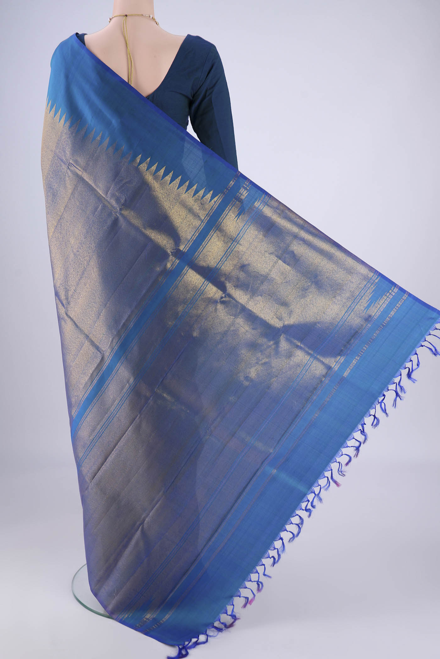 Flat view of Royal Blue Kanjivaram Silk Saree with Plain Body and Rising Temple Border. 
