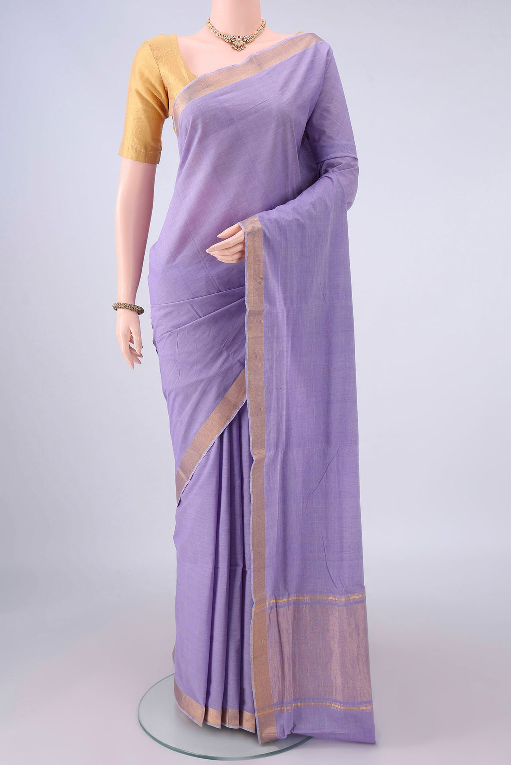 Lavender Mangalagiri Cotton Saree with Plain Body and Zari Border.  displayed on a mannequin