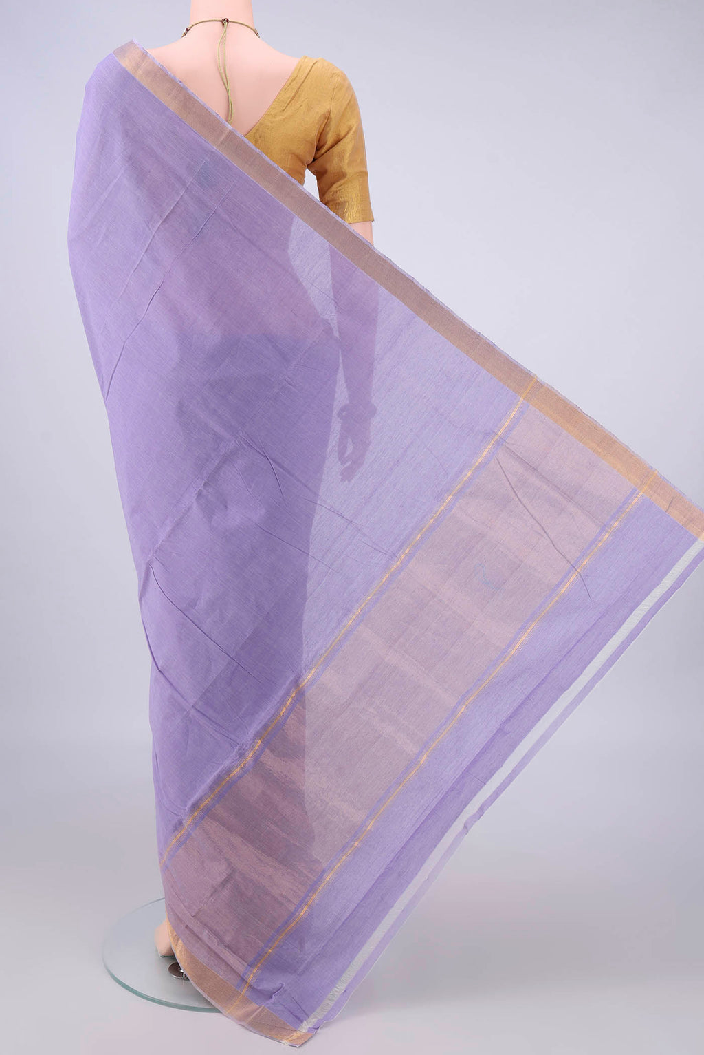 Flat view of Lavender Mangalagiri Cotton Saree with Plain Body and Zari Border. 