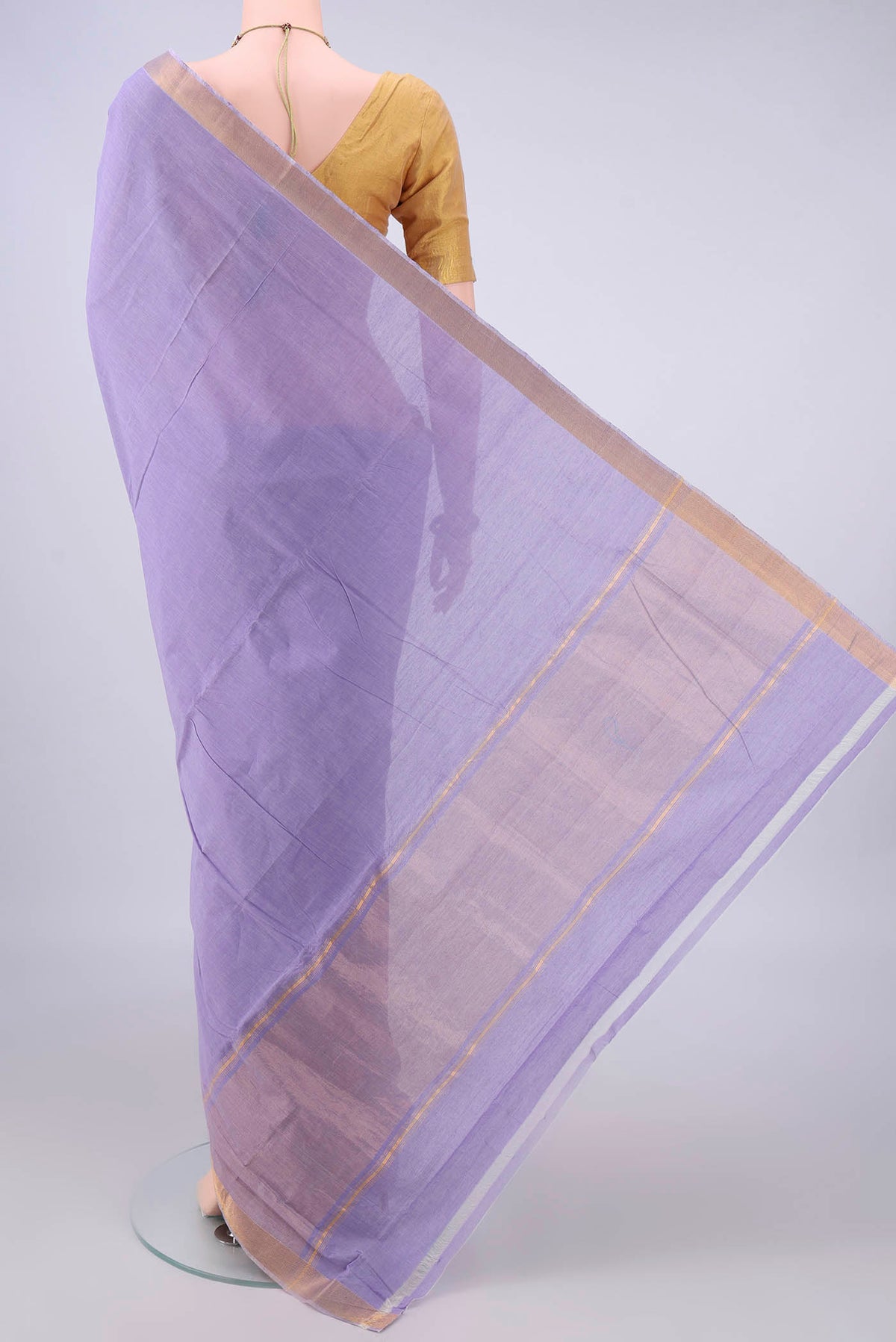 Flat view of Lavender Mangalagiri Cotton Saree with Plain Body and Zari Border. 