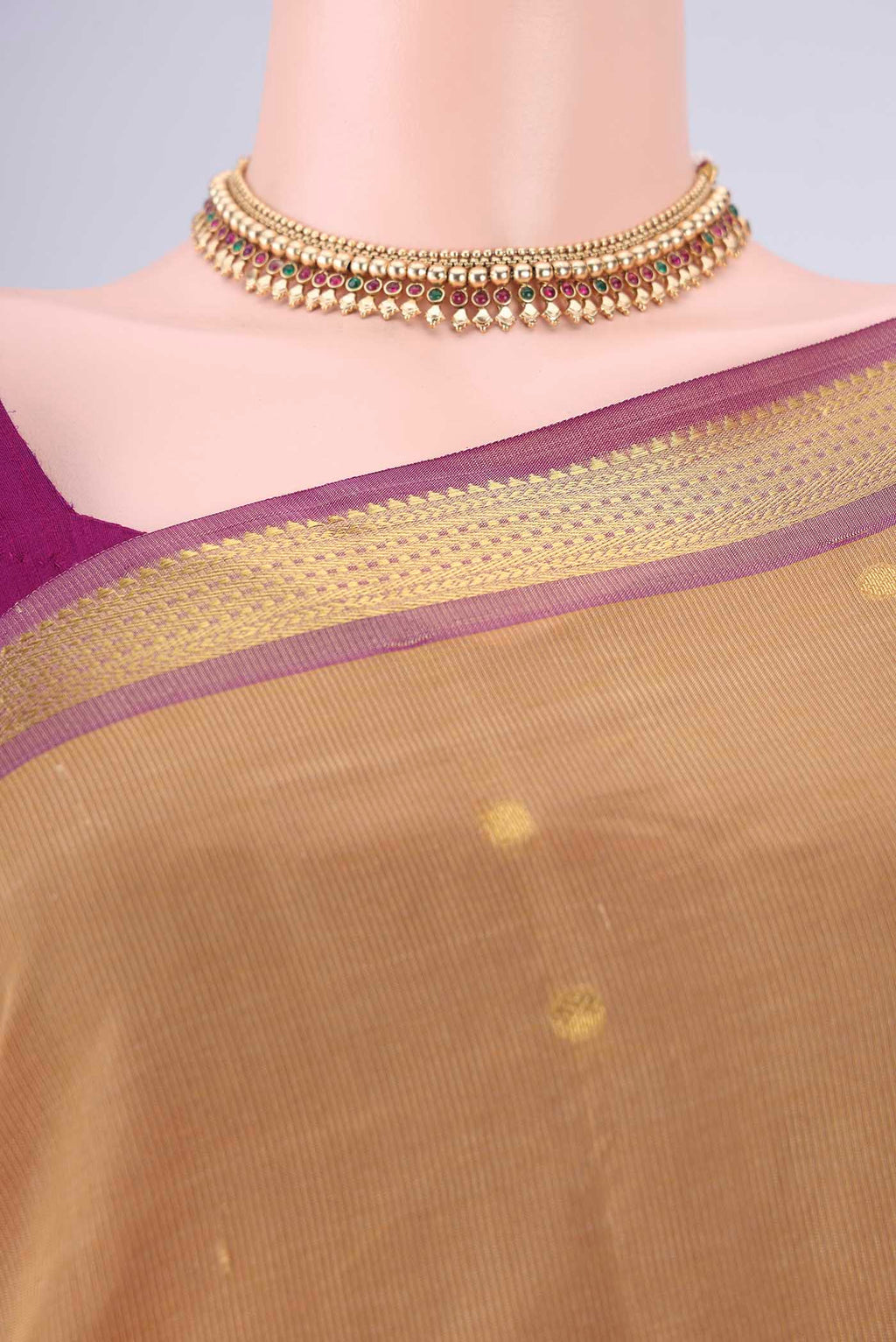 Border image of Dark Beige Coimbatore Silk Cotton Saree with Zari Butta on the body and Zari Border. 