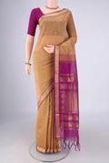 Dark Beige Coimbatore Silk Cotton Saree with Zari Butta on the body and Zari Border.  displayed on a mannequin