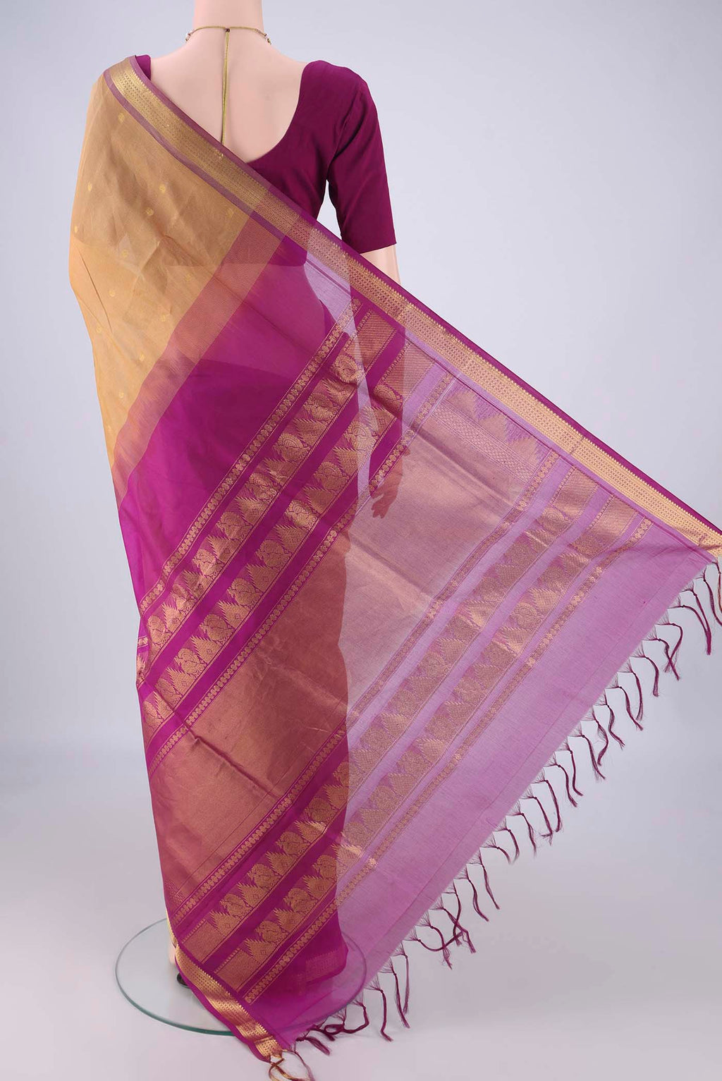 Flat view of Dark Beige Coimbatore Silk Cotton Saree with Zari Butta on the body and Zari Border. 