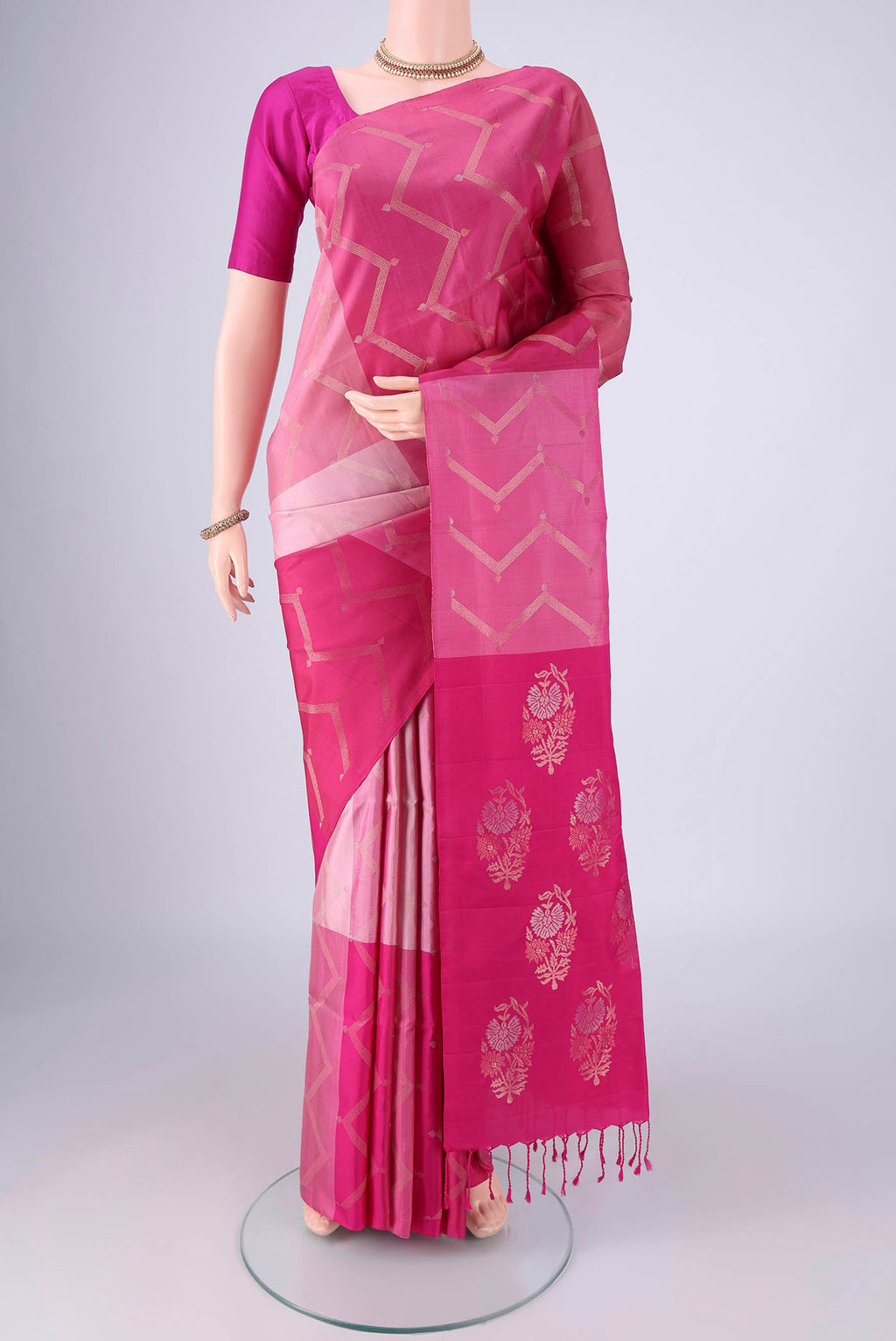 Multi Color Soft Silk Saree with Zari Butta on the body and Without Border.  displayed on a mannequin