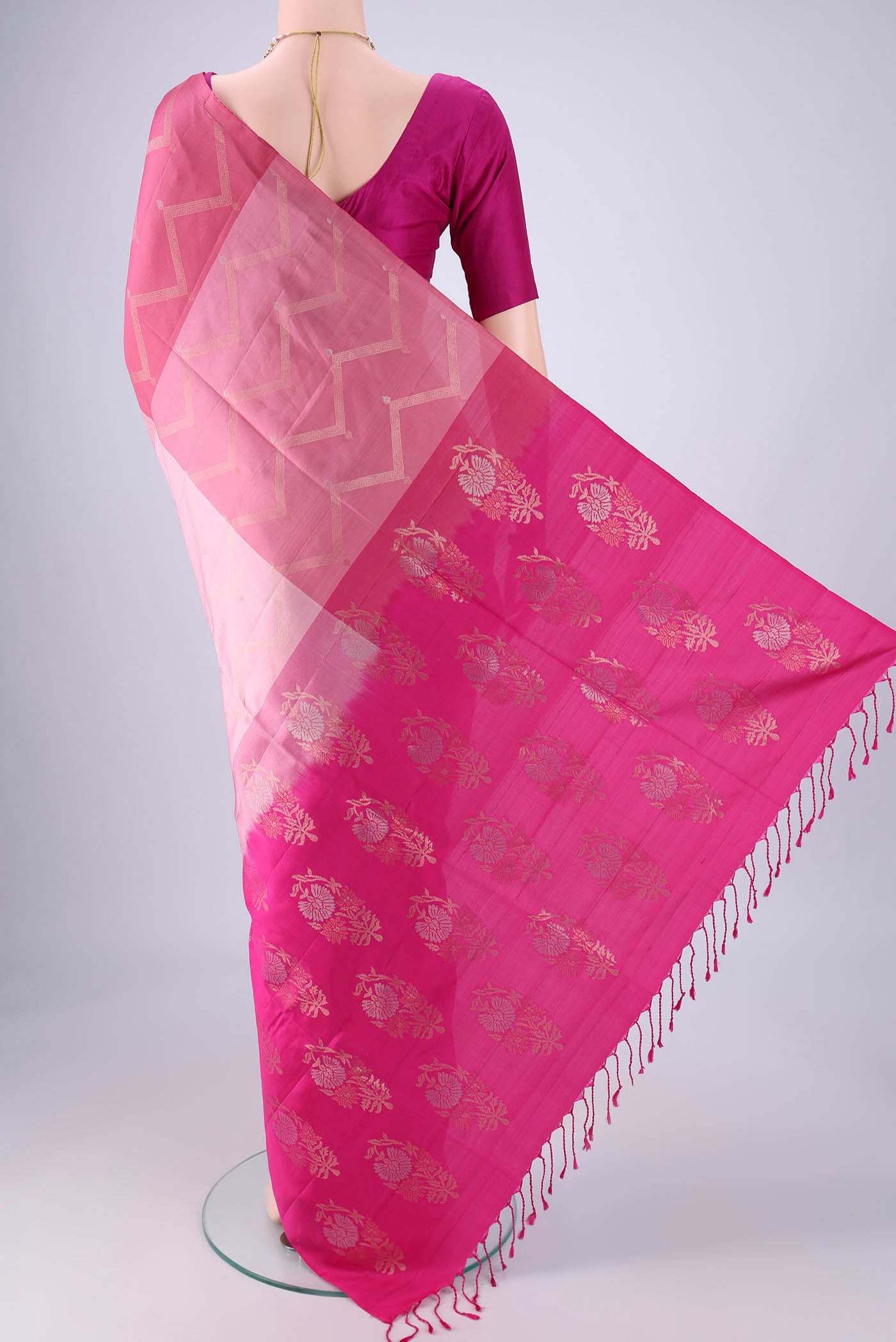 Flat view of Multi Color Soft Silk Saree with Zari Butta on the body and Without Border. 