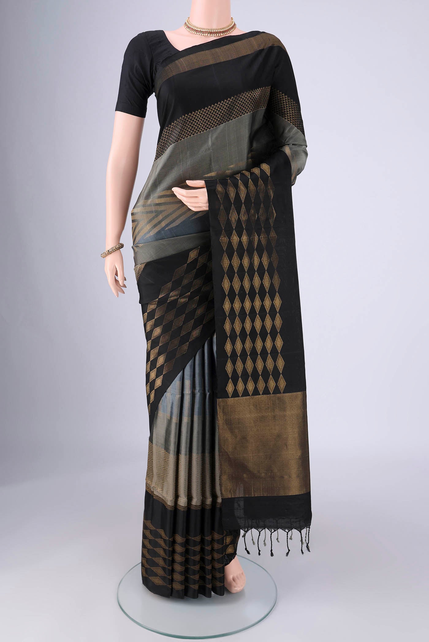 Multi Color Soft Silk Saree with Stripes on the body and Zari Border.  displayed on a mannequin