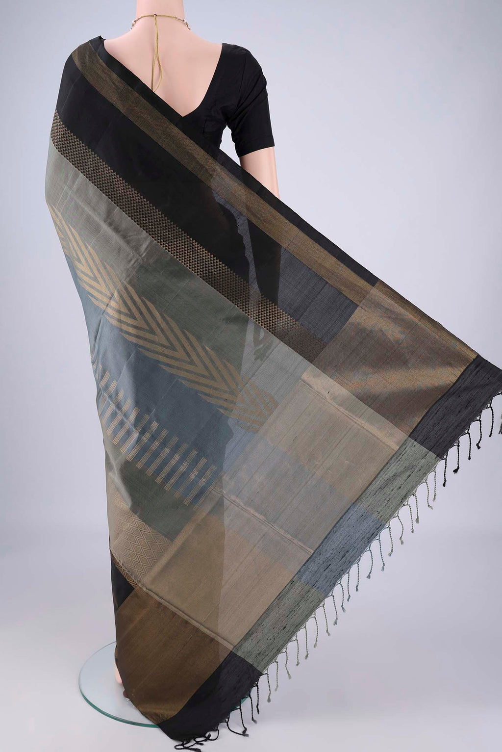 Flat view of Multi Color Soft Silk Saree with Stripes on the body and Zari Border. 
