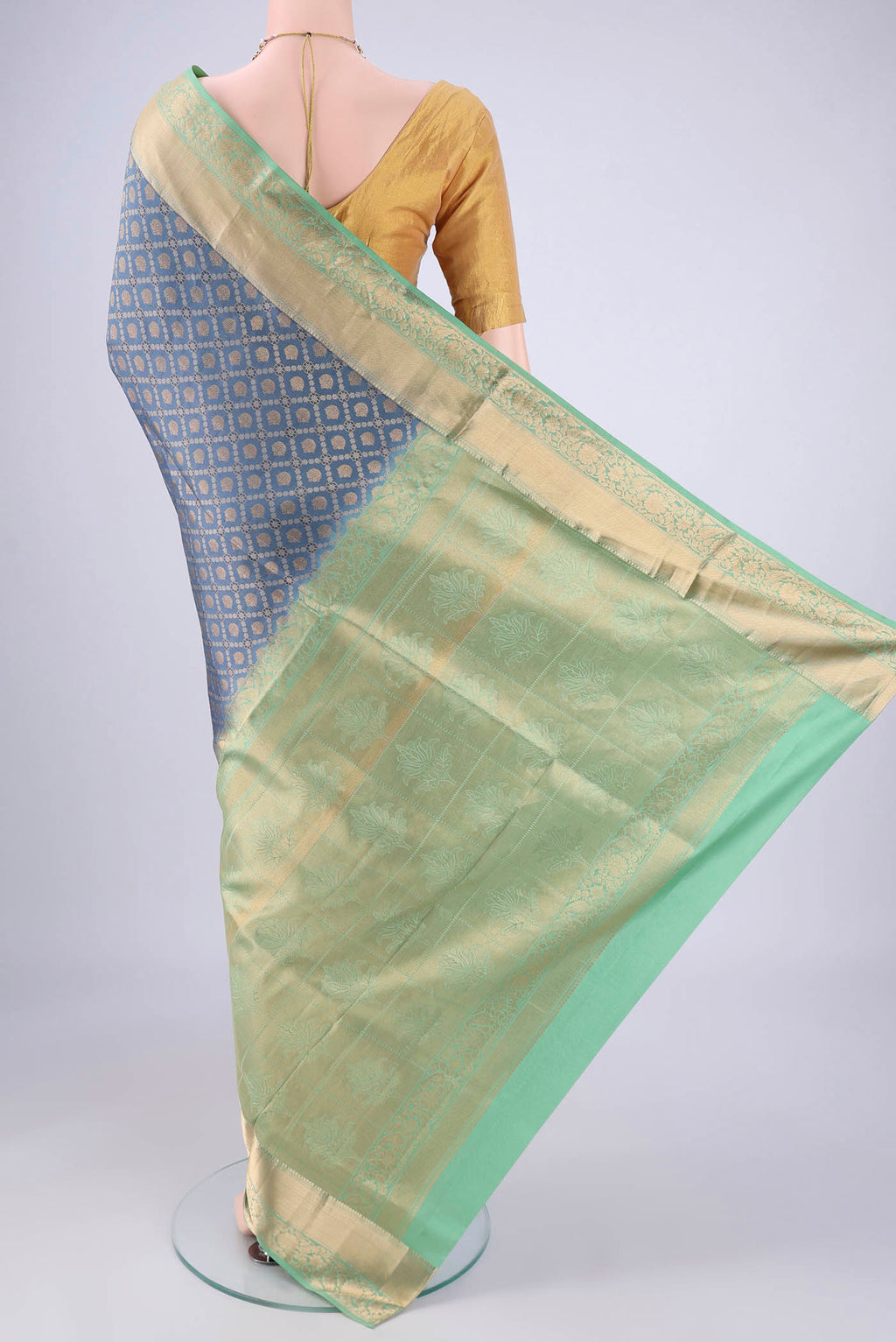 Flat view of Maya Blue Soft Silk Saree with Zari Brocade on the body and Zari Border. 