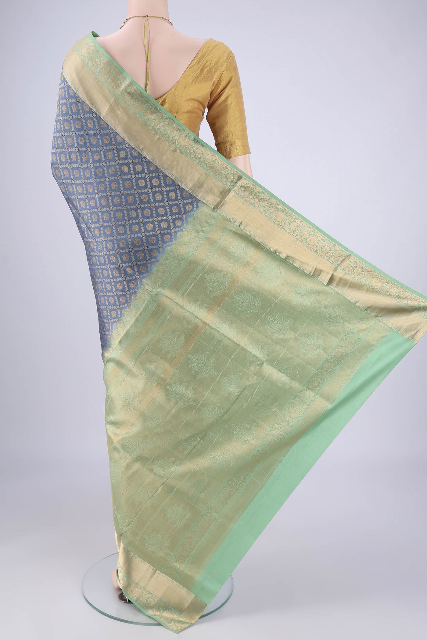 Flat view of Maya Blue Soft Silk Saree with Zari Brocade on the body and Zari Border. 