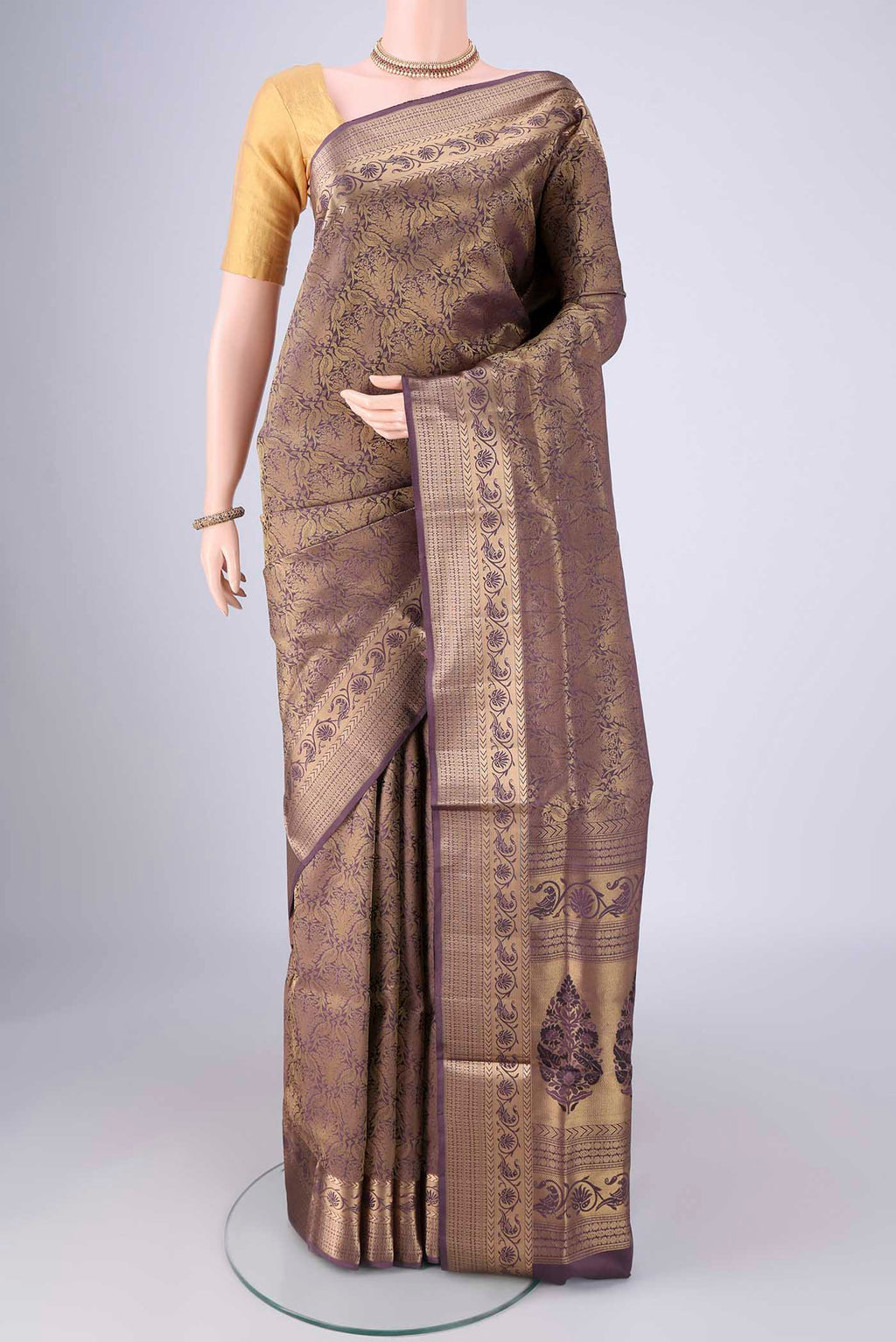 Dark Mauve Soft Silk Saree with Zari Brocade on the body and Zari Border.  displayed on a mannequin