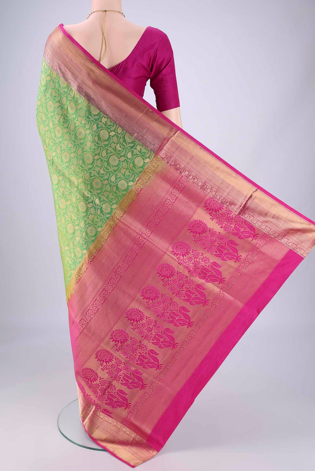 Flat view of Green Soft Silk Saree with Zari Brocade on the body and Zari Border. 