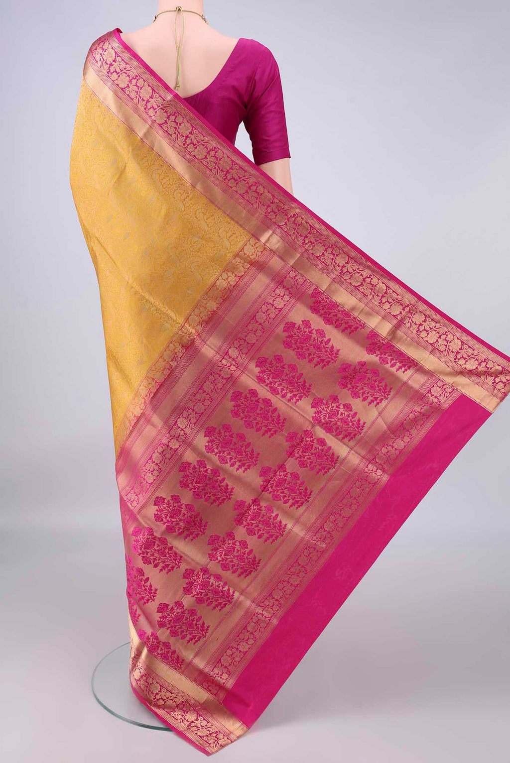 Flat view of Pure Silk Yellow Soft Saree with Zari Brocade on the body and Zari Border. 