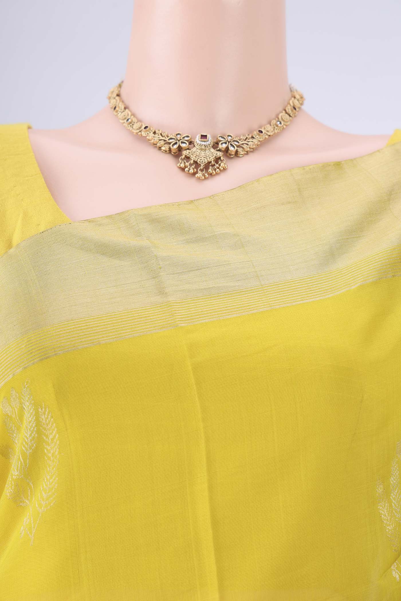 Border image of Acid Green Kora Cotton Saree with Zari Butta on the body and Zari Border. 