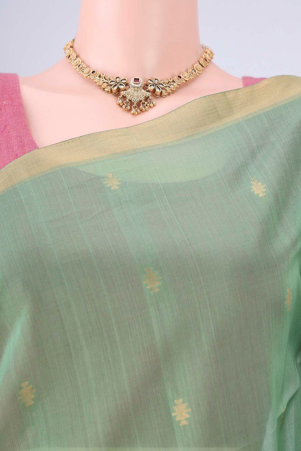 Border image of Light Green Kora Cotton Saree with Zari Butta on the body and Zari Border. 
