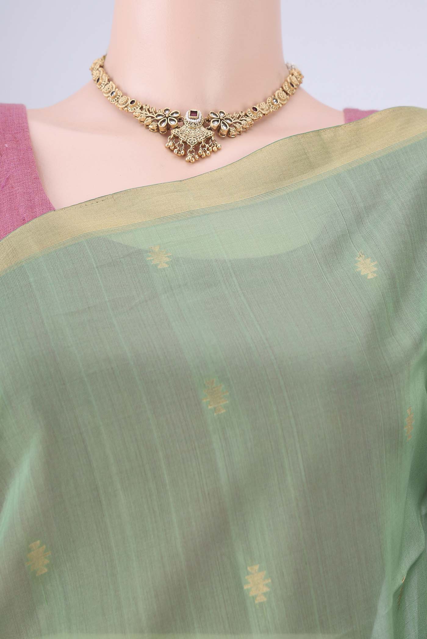 Border image of Light Green Kora Cotton Saree with Zari Butta on the body and Zari Border. 