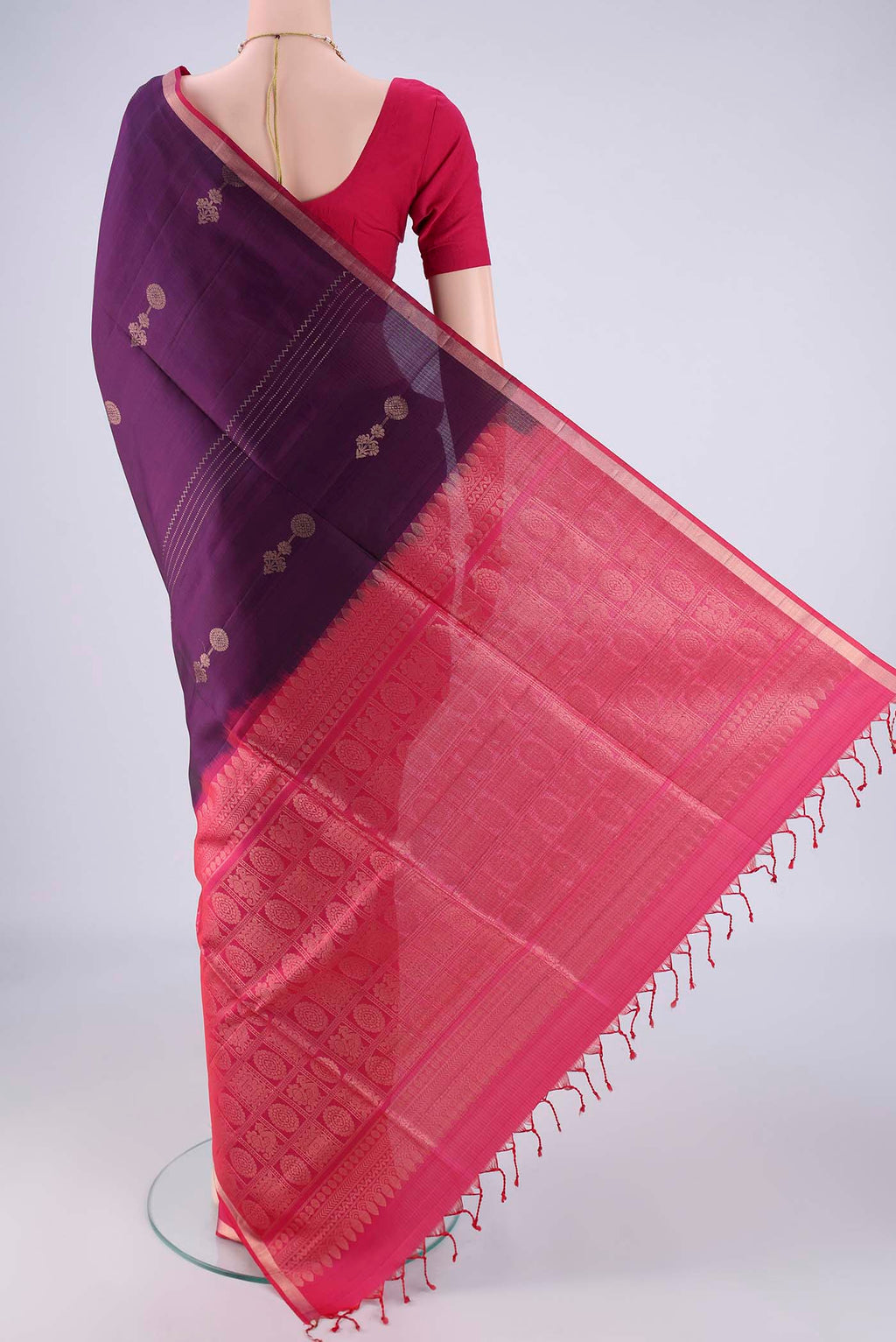 Flat view of Purple Soft Silk Saree with Zari Butta on the body and Zari Border. 