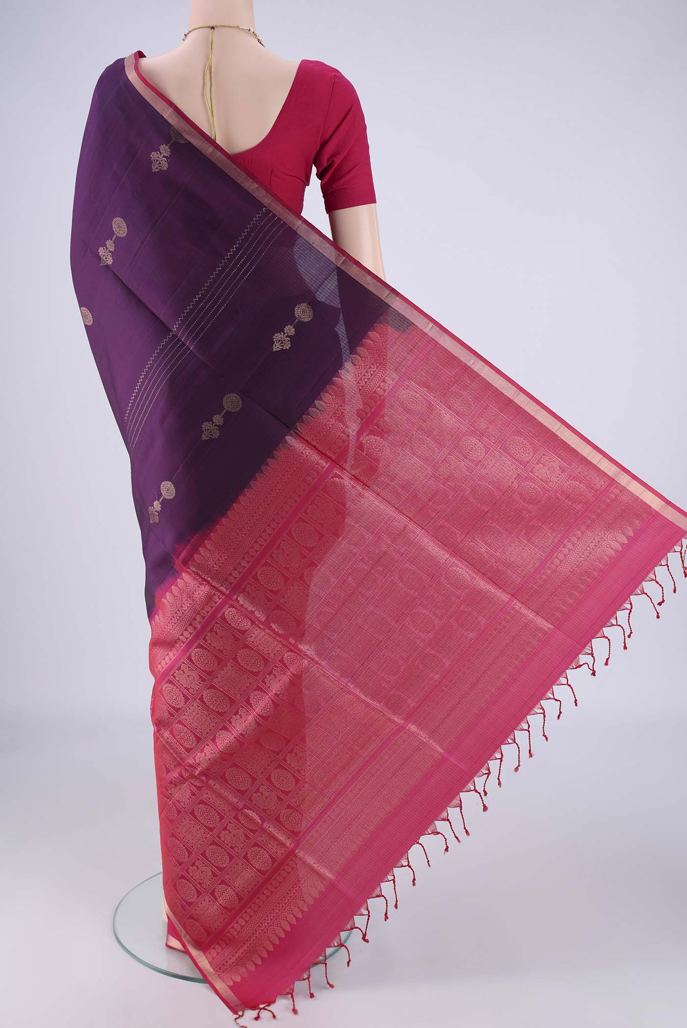Flat view of Purple Soft Silk Saree with Zari Butta on the body and Zari Border. 