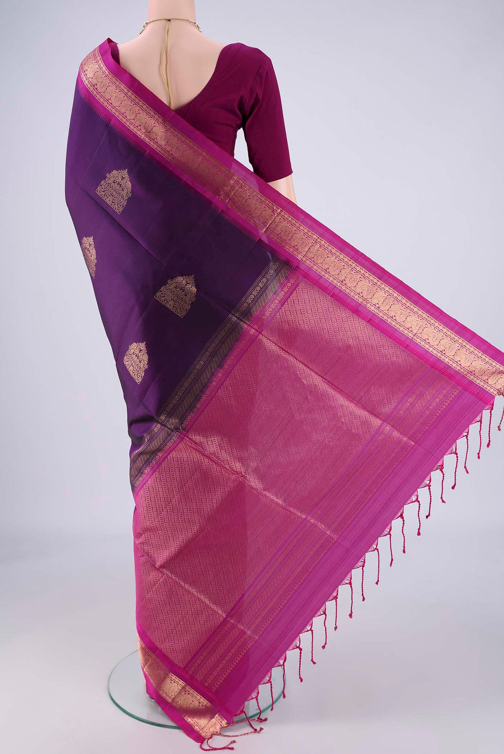 Flat view of Purple Soft Silk Saree with Zari Butta on the body and Zari Border. 