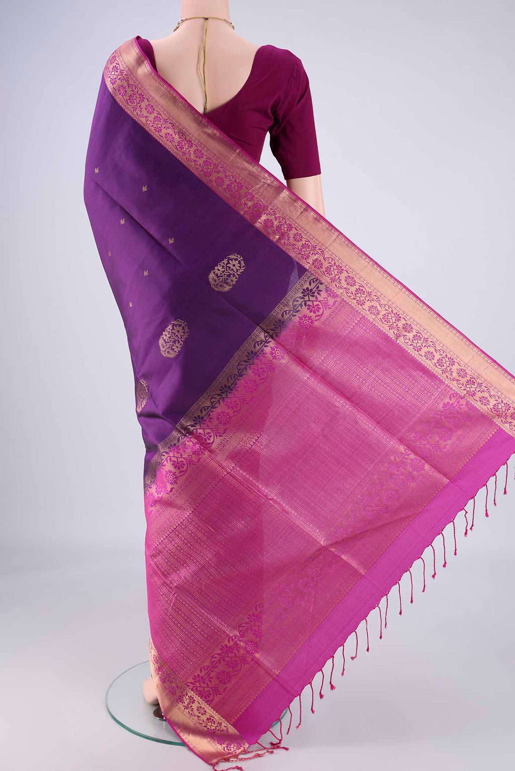 Flat view of Purple Soft Silk Saree with Zari Butta on the body and Zari Border. 