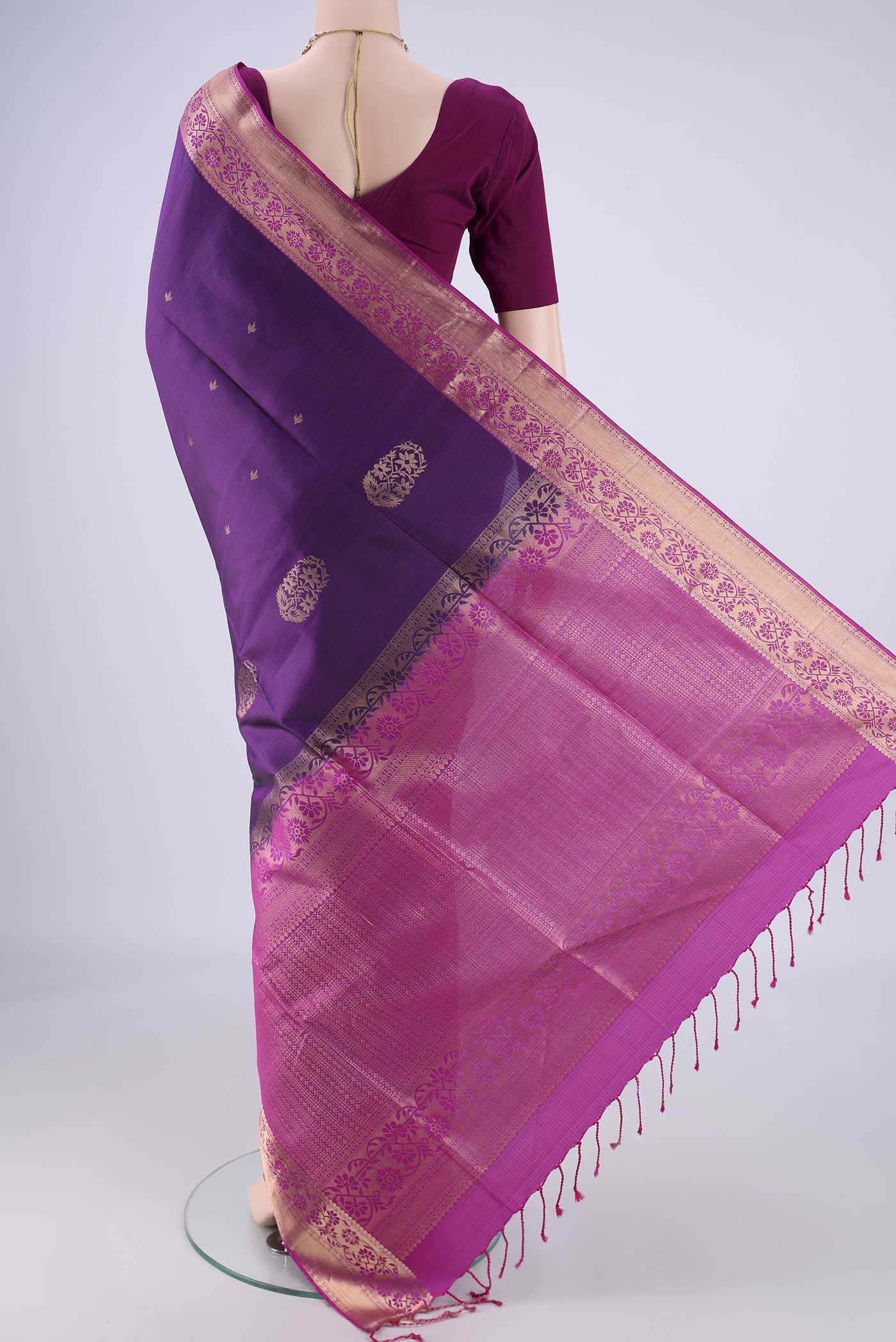 Flat view of Purple Soft Silk Saree with Zari Butta on the body and Zari Border. 