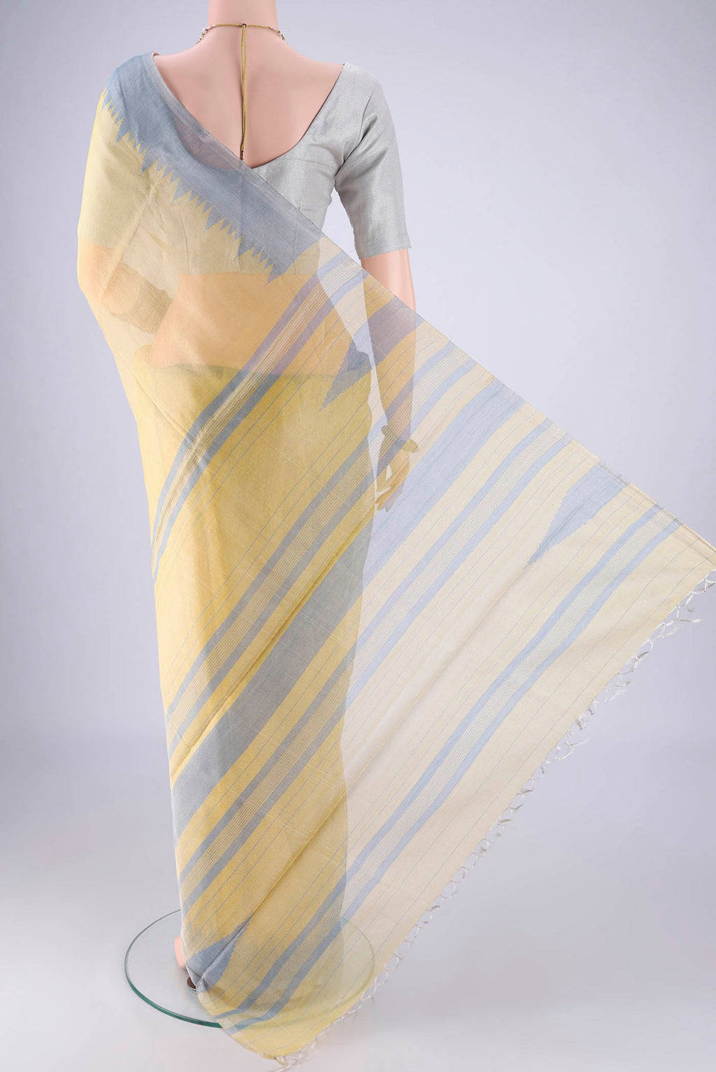 Flat view of Lemon Yellow MP Tussar Saree with Plain Body and Temple Border. 