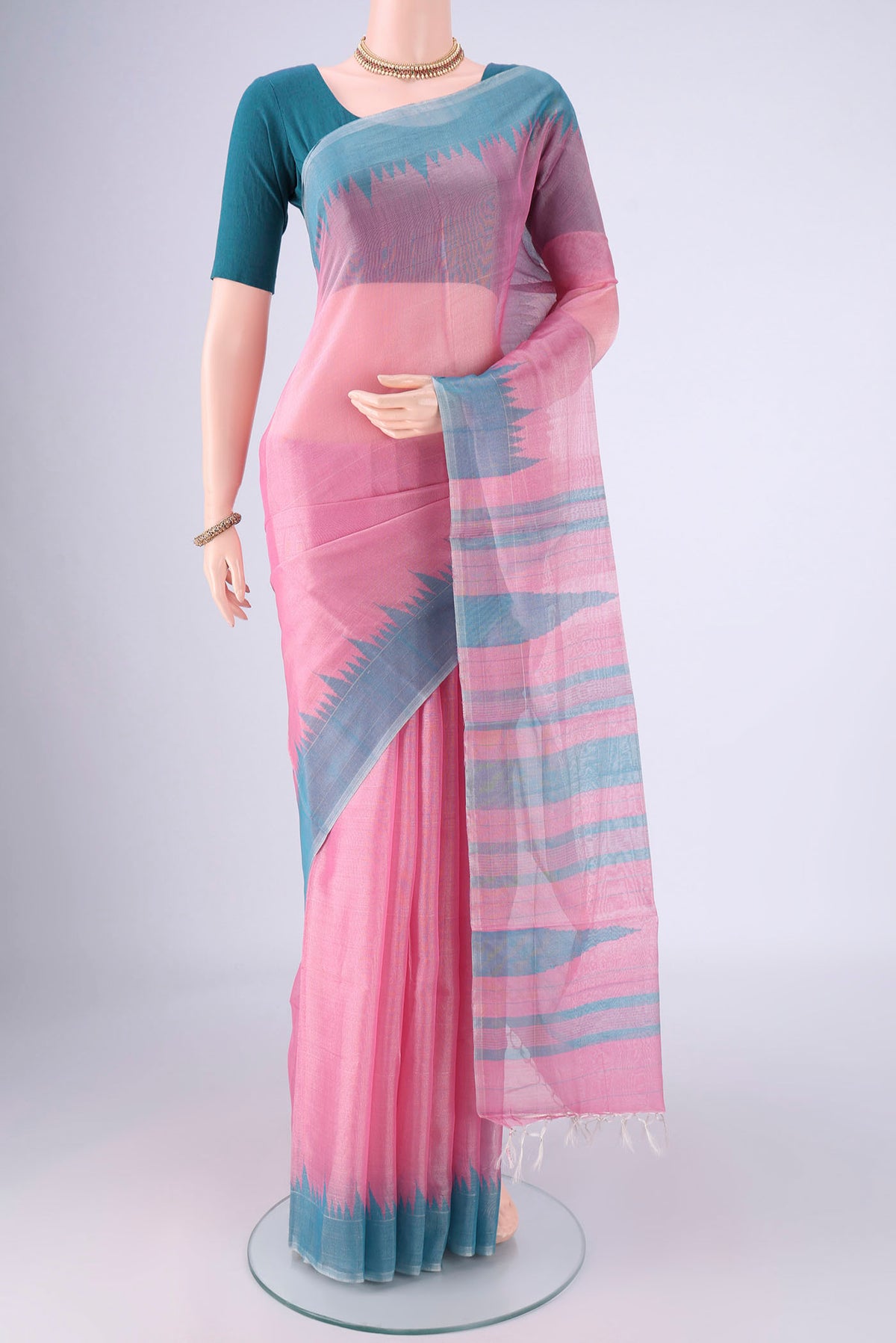 Rose pink MP Tussar Saree with Plain Body and Temple Border.  displayed on a mannequin