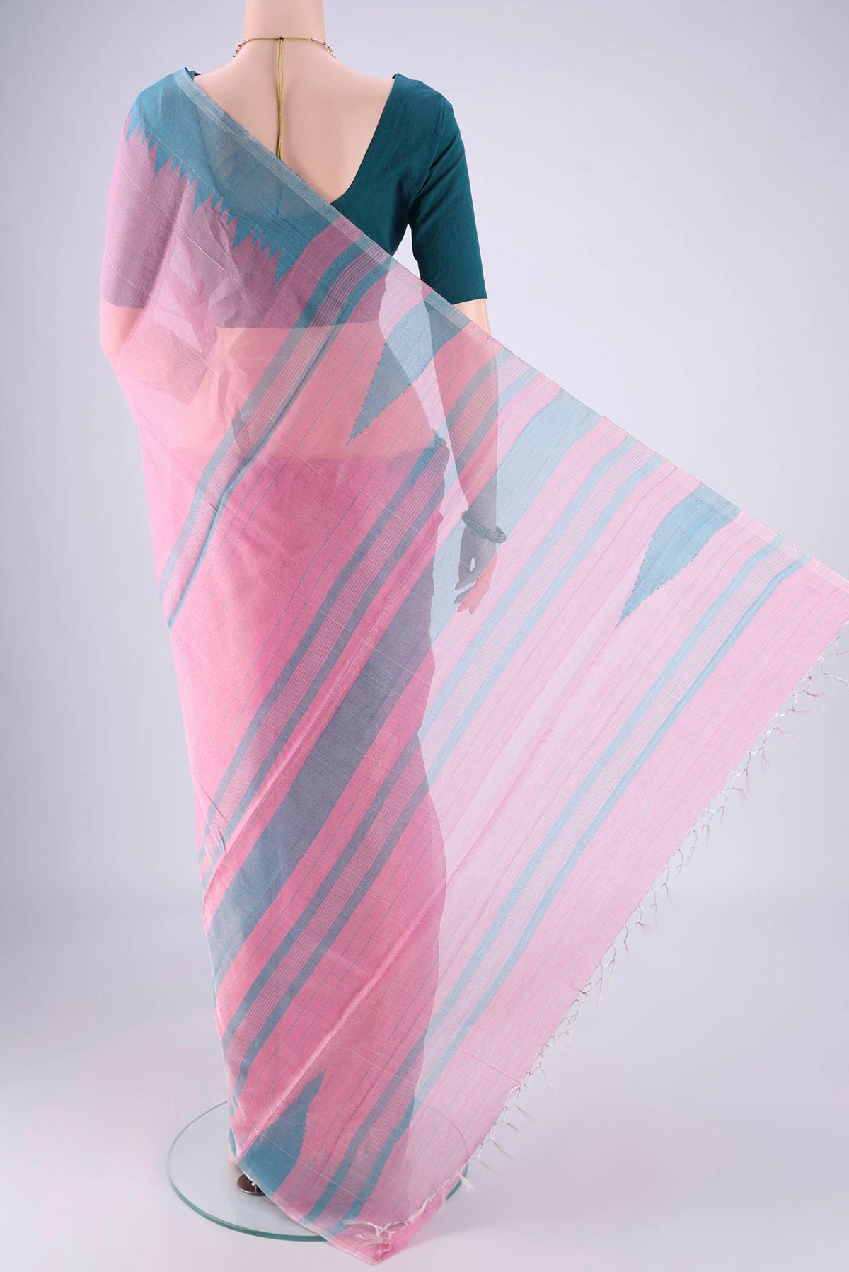 Flat view of Rose pink MP Tussar Saree with Plain Body and Temple Border. 