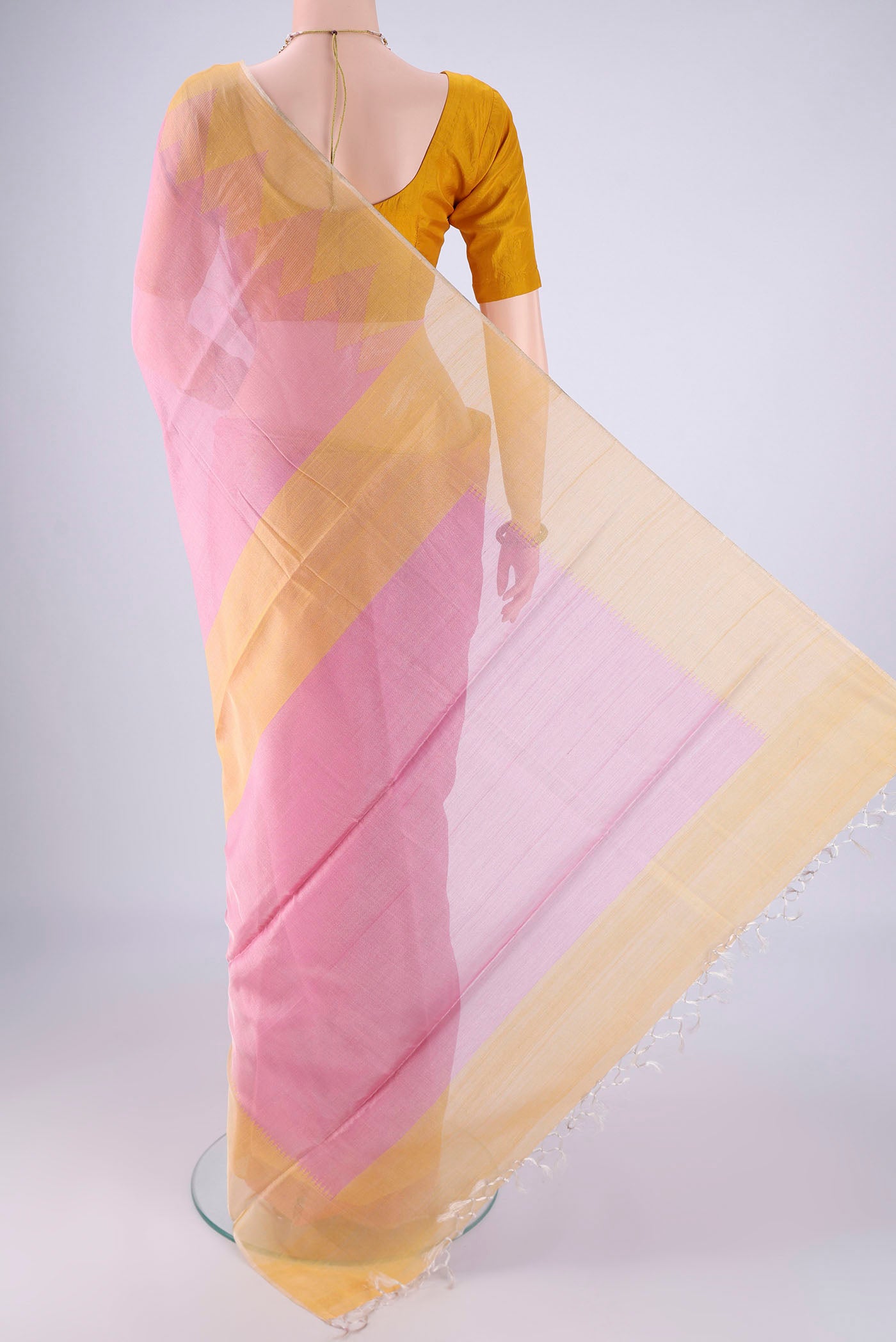 Flat view of Pink MP Tussar Saree with Plain Body and Temple Border. 